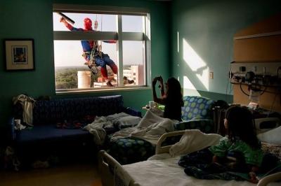Superhero Window Washers Cheer Up Children at Hospital